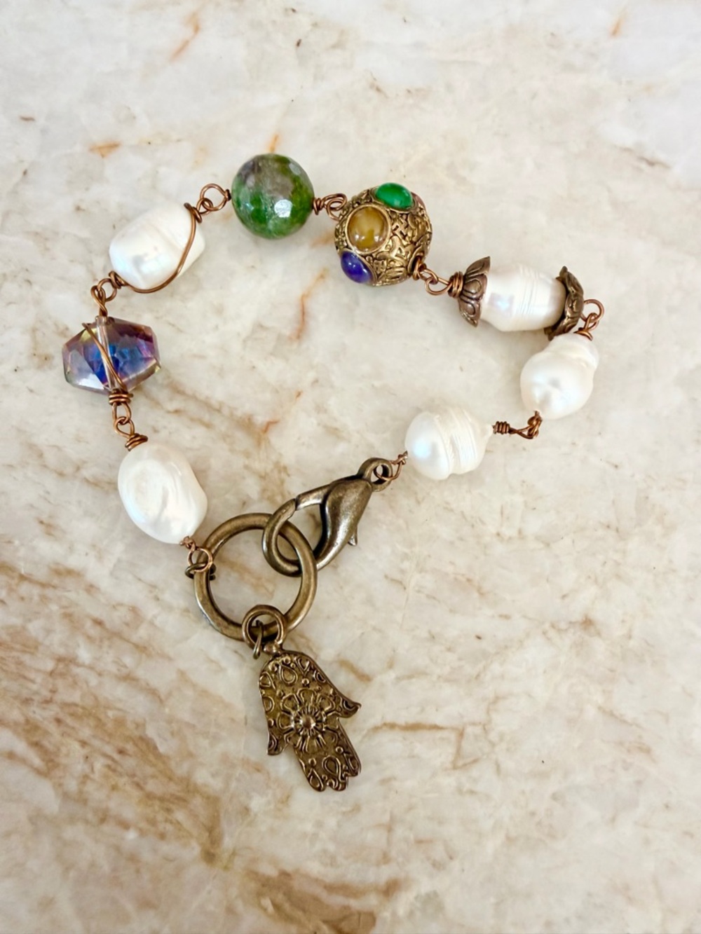 Handcrafted White Pearl Bracelet with Green Red Blue Accent Bead and Hamsa Charm